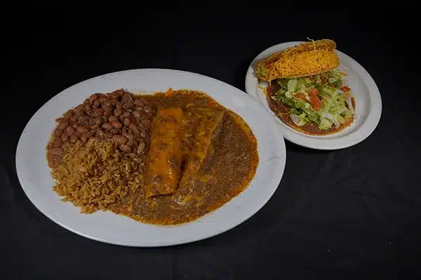 2 plates with Burrito, rice, and beans and taco