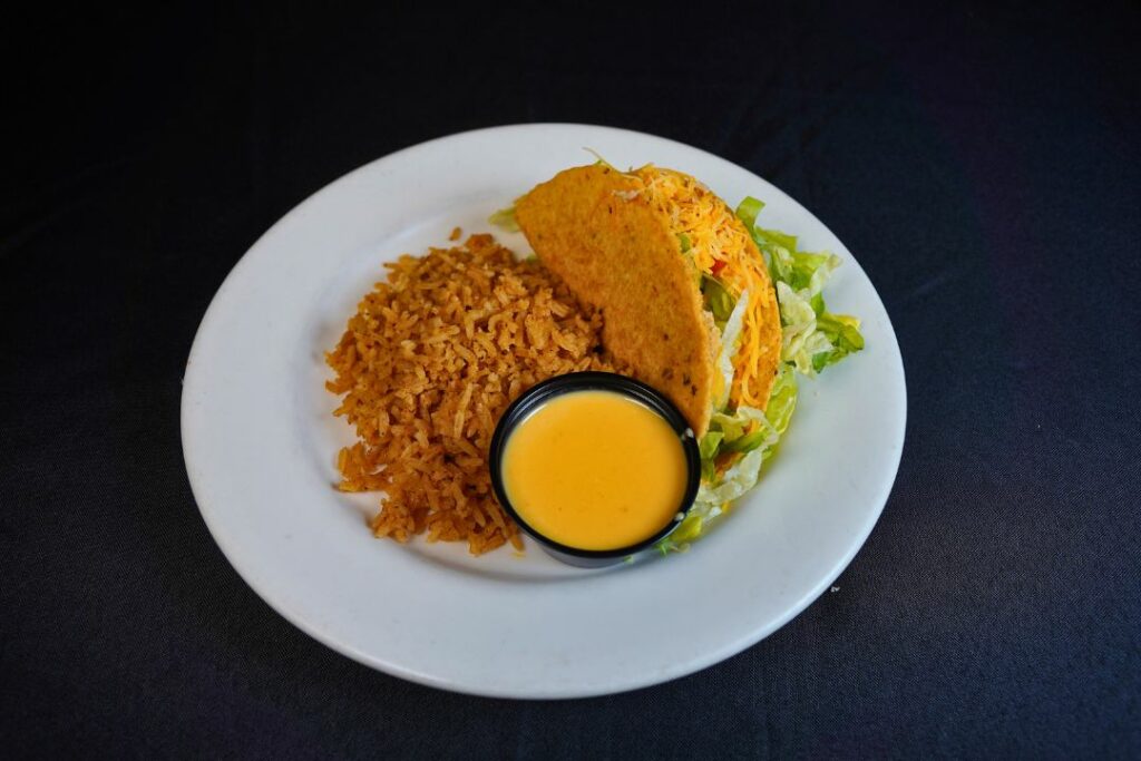 taco with rice and cheese sauce