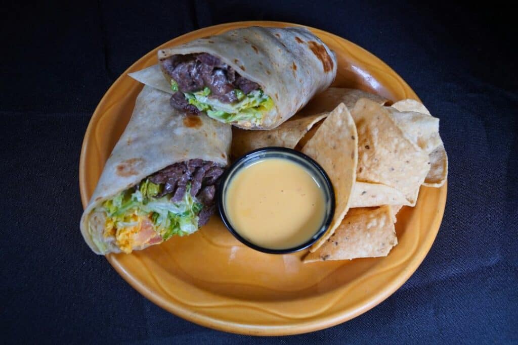 Beef Fajita Wrap with chips and queso