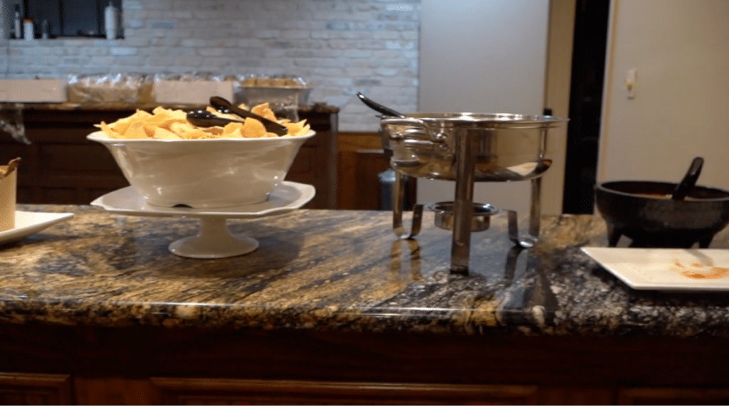 Colorful tamales displayed on festive holiday catering event table.